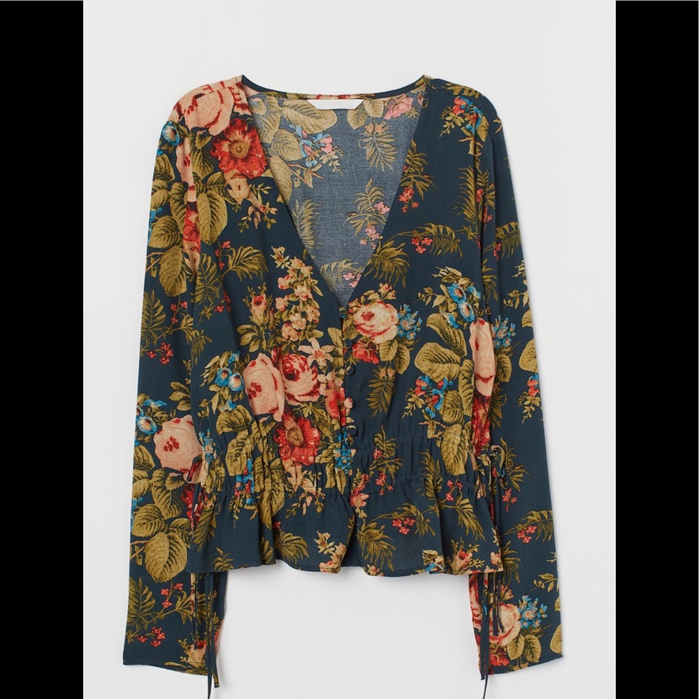 NWT- H&M V-neck Floral Blouse with buttons and decorative ties around waist.
